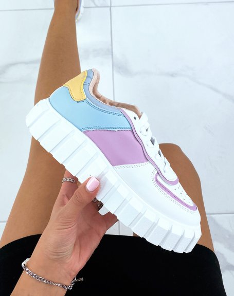 White sneakers with blue, yellow, pink and purple inserts with chunky sole