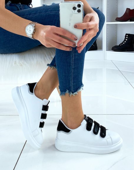 White sneakers with metallic black detail