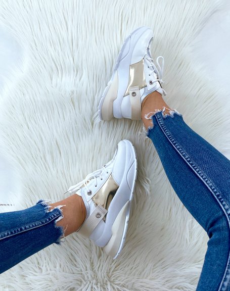 White sneakers with multiple panels and fancy sole