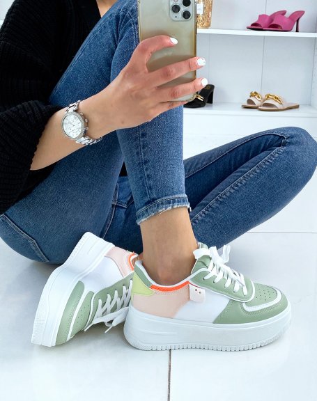 White sneakers with pastel green inserts