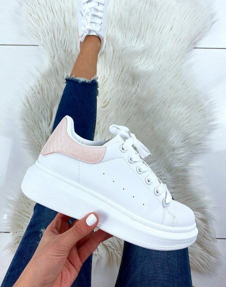 White sneakers with pastel pink yoke