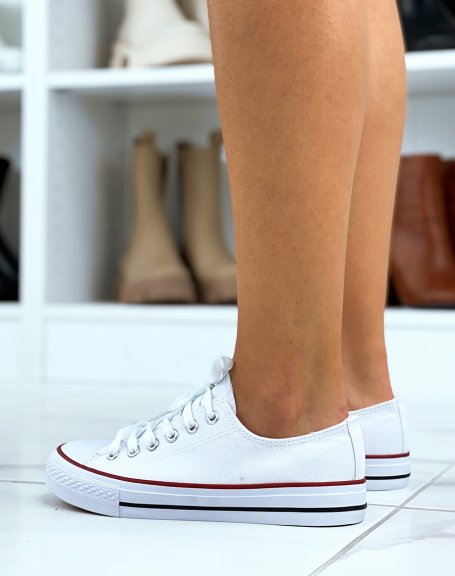 White sneakers with red piping