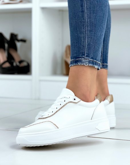 White sneakers with sequined gold edging