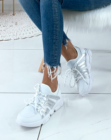White sneakers with silver inserts and fancy laces