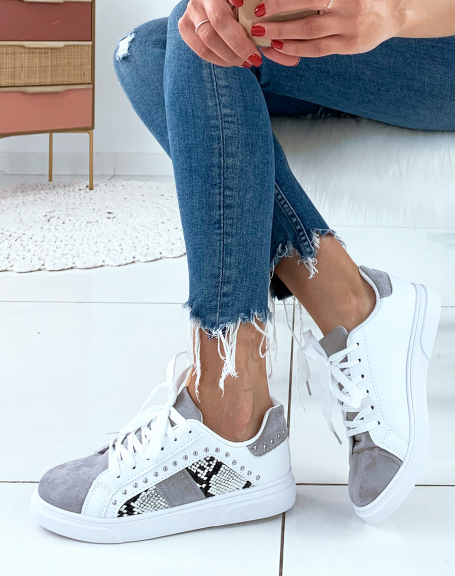 White sneakers with studs and gray and python inserts