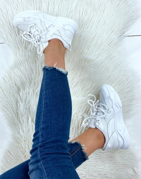 White sneakers with thick dual-material soles