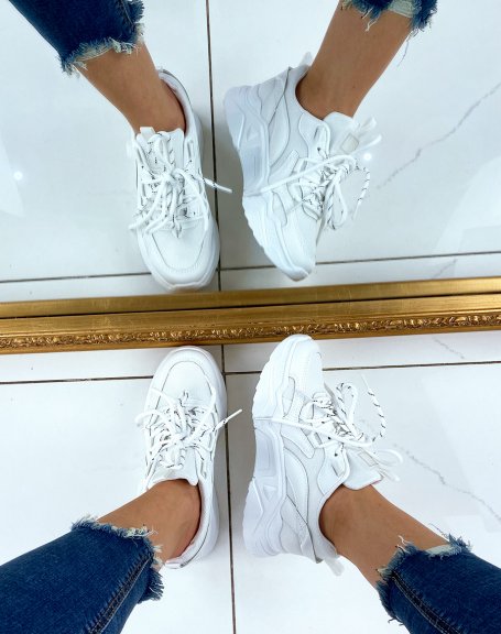 White sneakers with thick dual-material soles