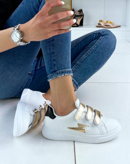 White sneakers with velcro and gold pattern with black insert