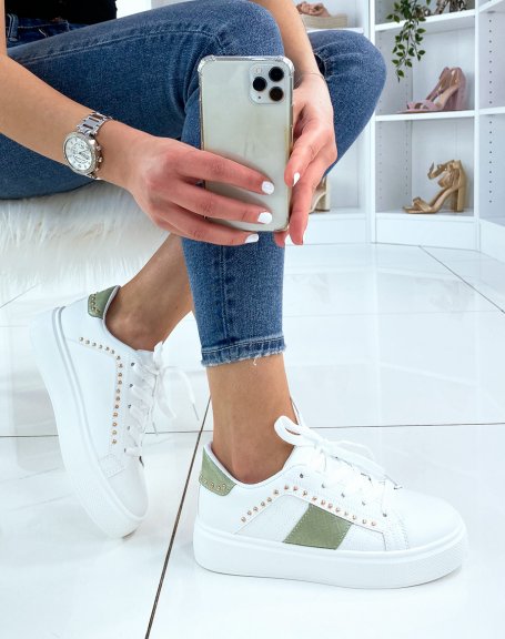 White studded sneaker with green inserts