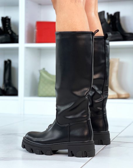 Wide black boots with notched sole