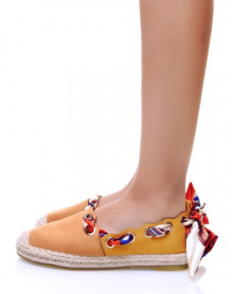Yellow espadrilles with ribbons