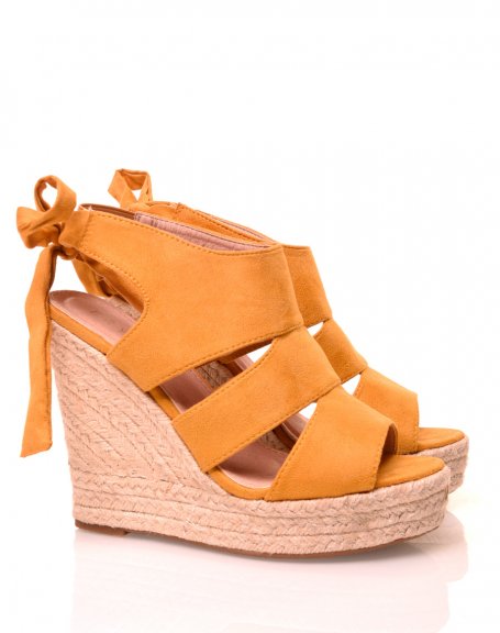 Yellow suede wedge sandals with bow
