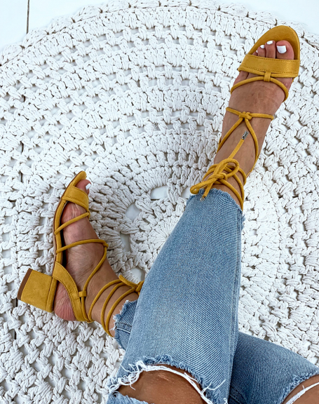 Yellow suedette sandals with low heels and ankle laces