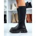 Black bi-material boots with pocket and notched soles