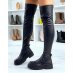 Black chelsea-inspired thigh-high boots with chunky flat sole