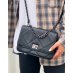 Black quilted-effect crossbody bag with silver chain