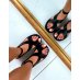Black sandals with wide crossed straps