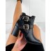 Black studded ankle boots with heel and square toe