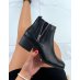 Low black ankle boots with silver closure
